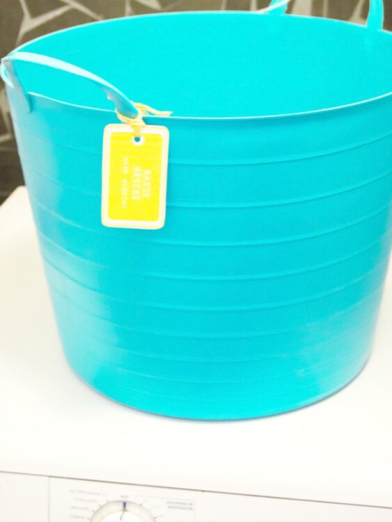 Nasse Badesachen verstauen