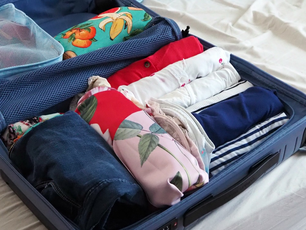 Koffer packen rollen